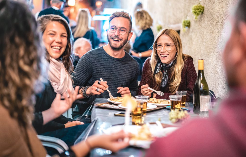 family dining out at restaurant