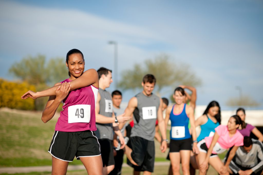 runners warming up for an outdoor race